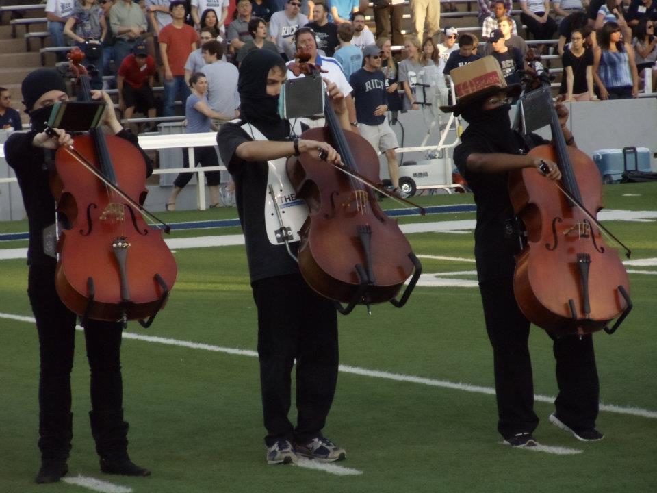 Cellists in Rice university Marching Owl Band.